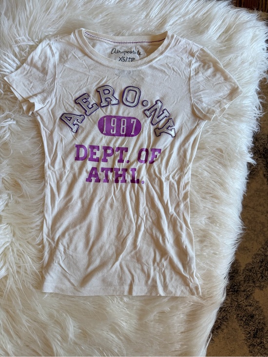 Aeropostale Tops - Aeropostale Cream Short Sleeve Tee with Purple Logo Print